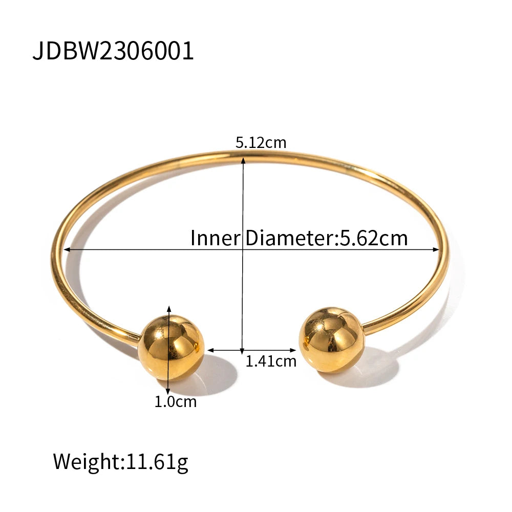 Pulsera acero inoxidable en oro de 18 quilates con doble bola